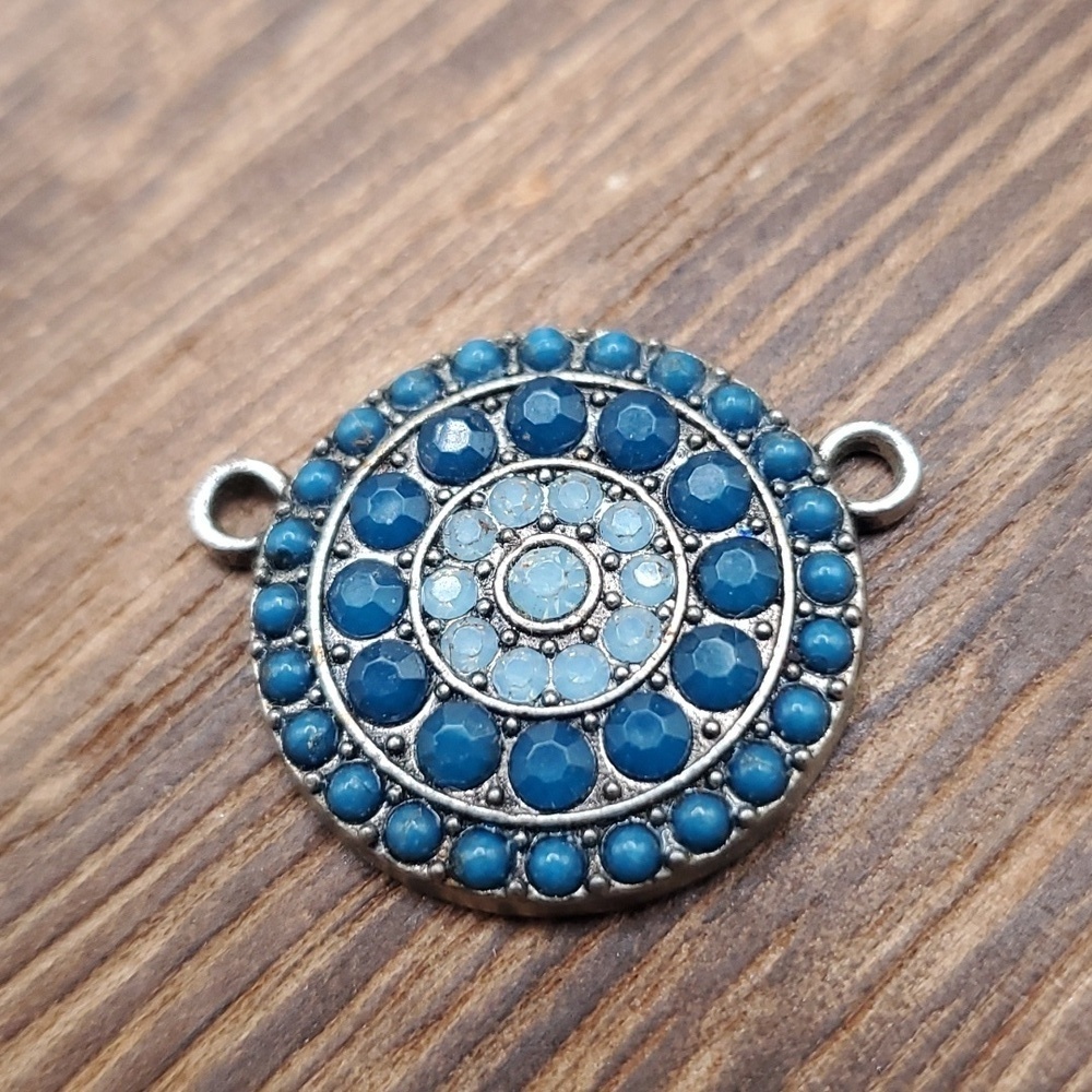 Woven mandala styled pendant